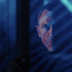 James Bond behind a window.